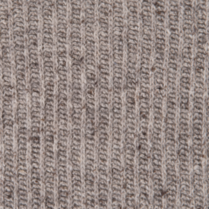 Stickad beige